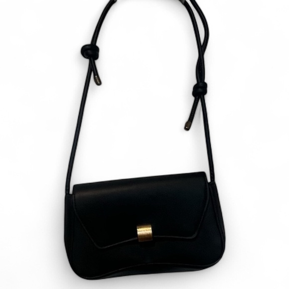 Chic Black Crossbody Bag with Gold Accent - Picture 1 of 1
